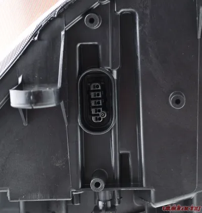 Hella Headlight Assembly Left 2003-2009 - 247001561