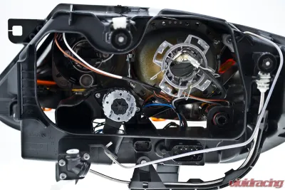 Hella Headlight Assembly Left 2003-2009 - 247001561