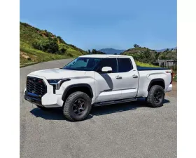 Westin Automotive PRO TRAXX 4 Oval Nerf Step Bars Black for 2022-2024 Toyota Tundra Double Cab