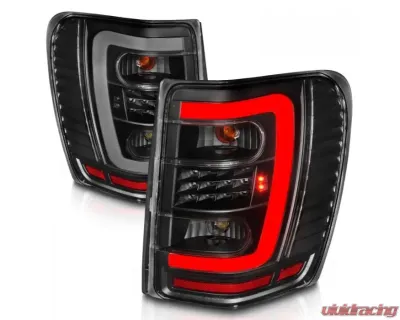 Anzo USA LED Tail Lights w/ Light Bar Black Housing Clear Lens Jeep Grand Cherokee 1999-2004 - 311394