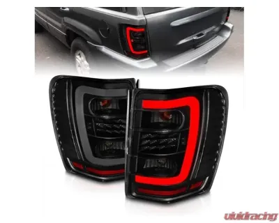 Anzo USA LED Tail Lights w/ Light Bar Black Housing Smoke Lens Jeep Grand Cherokee 1999-2004 - 311395