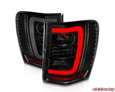 Anzo USA LED Tail Lights w/ Light Bar Black Housing Smoke Lens Jeep Grand Cherokee 1999-2004 - 311395
