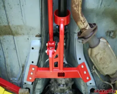 UMI Performance Tunnel Mounted Torque Arm TH400 Transmission w/ Front Drive Shaft Loop 3" Red GM F-Body 1982-1992 - 2219-R