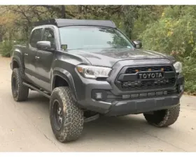 Cali Raised LED Premium Roof Rack 42 in White Dual Row Spot Beam LED Light Bar Blue Small No Lights Toyota Tacoma 2005-2021