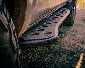 Cali Raised LED Step Edition Rock Slider Double Cab | Long Bed w/ Kick Out | No Filler Plate | Raw Steel Toyota Tacoma 2024+