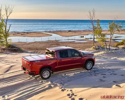 Undercover Fusion 6ft 4in Hard Folding Bed & Tonneau Cover without RAMBox (Paint Code PR4 Flame Red) RAM 2500 | 3500 2019-2021 - AR32004L-PR4