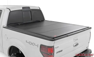 Rough Country Hard Tri-Fold Flip Up Bed Cover 5'7" Bed Ford F-150 2WD | 4WD 2004-2014 - 49214550