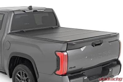 Rough Country Hard Tri-Fold Flip Up Bed Cover 5'7" Toyota Tundra 2WD | 4WD 2022-2025 - 49514551