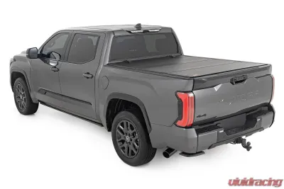 Rough Country Hard Tri-Fold Flip Up Bed Cover 5'7" Toyota Tundra 2WD | 4WD 2022-2025 - 49514551