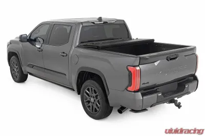 Rough Country Hard Tri-Fold Flip Up Bed Cover 5'7" Toyota Tundra 2WD | 4WD 2022-2025 - 49514551