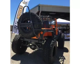 Wizard Works Offroad Scrambler Rear Bumper and Swing Down Tire Carrier Bare Steel Jeep Scrambler 1981-1985