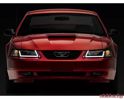 Raxiom Axial Series Clear Lens Black Housing Headlights w/ LED Bar Ford Mustang 1999-2004 - 422712