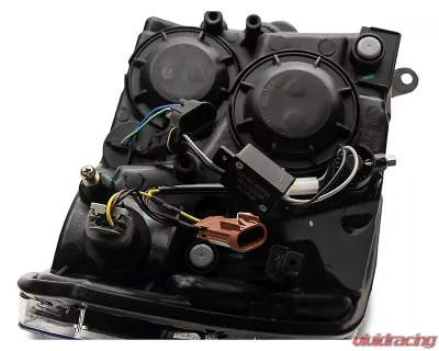 Raxiom Axial Series Clear Lens Black Housing Headlights w/ LED Bar Ram 1500 | 2500 | 3500 w/ Factory Halogen Non-Projector Headlights 2009-2018 - R131481