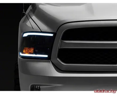 Raxiom Axial Series Clear Lens Black Housing Headlights w/ LED Bar Ram 1500 | 2500 | 3500 w/ Factory Halogen Non-Projector Headlights 2009-2018 - R131481