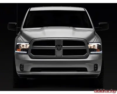 Raxiom Axial Series Clear Lens Black Housing Headlights w/ LED Bar Ram 1500 | 2500 | 3500 w/ Factory Halogen Non-Projector Headlights 2009-2018 - R131481