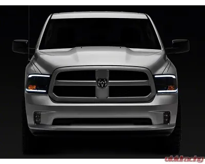 Raxiom Axial Series Clear Lens Black Housing Headlights w/ LED Bar Ram 1500 | 2500 | 3500 w/ Factory Halogen Non-Projector Headlights 2009-2018 - R131481