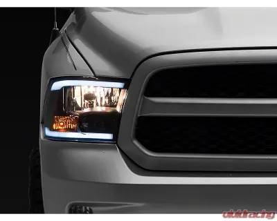 Raxiom Axial Series Clear Lens Black Housing Headlights w/ Sequential LED Bar Ram 1500 | 2500 | 3500 w/ Factory Halogen Non-Projector Headlights 2009-2018 - R131482