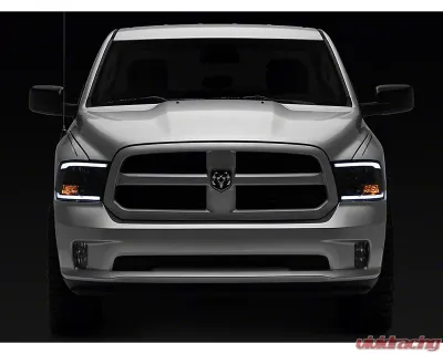 Raxiom Axial Series Clear Lens Black Housing Headlights w/ Sequential LED Bar Ram 1500 | 2500 | 3500 w/ Factory Halogen Non-Projector Headlights 2009-2018 - R131482
