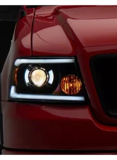 Raxiom Axial Series Clear Lens Black Housing Projector Headlights w/ Sequential LED Bar Ford F-150 2004-2008                                     - T566364 - Image 6