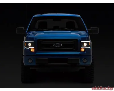 Raxiom Axial Series Clear Lens Black Housing Projector Headlights w/ LED Light Bar Ford F-150 w/ Factory Halogen Headlights 2009-2014 - T566369