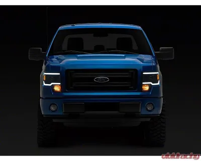 Raxiom Axial Series Clear Lens Black Housing Projector Headlights w/ LED Light Bar Ford F-150 w/ Factory Halogen Headlights 2009-2014 - T566369