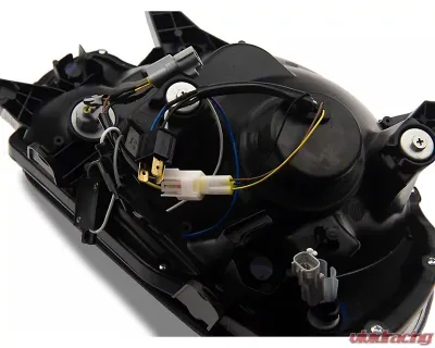 Raxiom Axial Series Clear Lens Black Housing Projector Headlight w/ Sequential LED Bar Toyota Tacoma 2012-2015 - TT21850