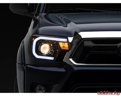 Raxiom Axial Series Clear Lens Black Housing Projector Headlight w/ Sequential LED Bar Toyota Tacoma 2012-2015 - TT21850