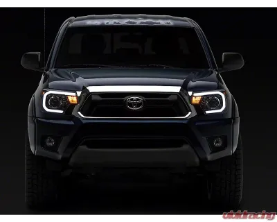 Raxiom Axial Series Clear Lens Black Housing Projector Headlight w/ Sequential LED Bar Toyota Tacoma 2012-2015 - TT21850