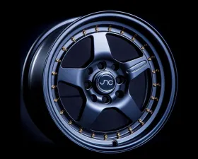 JNC JNC009 Wheel 15x8 4x100|4x114.3 25mm Matte Black w/ Gold Rivets