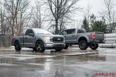 Corsa Performance 3.0" Front of Tire Exit Cat-Back Exhaust System w/Twin 3.5" Pro Series Black Tips Sport Sound Level: 21-25 Ford F-150 145" Wheel Base - 21156BLK