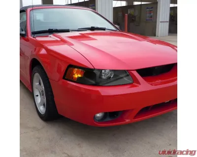 Spec-D Projector Headlights w/ Amber Reflectors (Matte Black Housing/Clear Lens) Ford Mustang 1999-2004 - 2LHP-MST99JM-RS