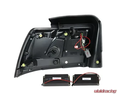 Spec-D Sequential LED Taillights (Matte Black Housing/Clear Lens) Ford Mustang 1999-2004 - LT-MST99JMLED-SQ-TM