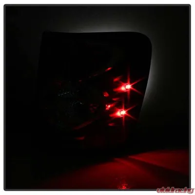 Spyder Auto Altezza Black Tail Lights for Jeep Grand Cherokee 1999-2004 - ALT-YD-JGC99-BK