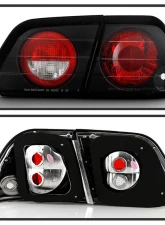 Spyder Auto Altezza Black Tail Lights for Nissan Maxima 1997-1999                                     - ALT-YD-NM97-BK - Image 2