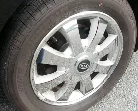 Quality Automotive Accessories 32-Piece Stainless Steel Wheel Skin Kia Optima 4-Door Sedan 2004-2005