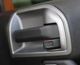 This charcoal door latch trim from Rugged Ridge fits 2011-2018 Jeep Wrangler JK Jeep Wrangler 2011-2018