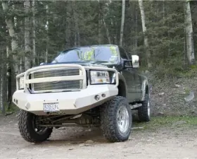 Fab Fours 94-02 Dodge HD Front Elite Ranch Bumper w/Pre-Runner Guard (2500 - 5500) w/Tow Hooks Bare