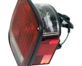Crown Automotive Jeep Replacement Tail Light, Left, w/ License Lamp Jeep Wrangler Left 1987-1990
