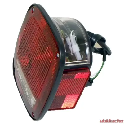 Crown Automotive Jeep Replacement Tail Light, Left, w/ License Lamp Jeep Wrangler Left 1987-1990 - 56002135