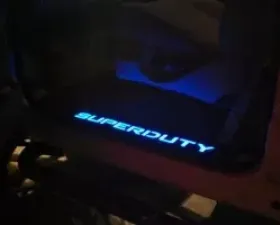 Recon Truck Accessories Illuminated Brushed Front Door Sills Superduty Logo Blue Illumination