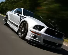 VeilSide 2005-2009 Ford Mustang GT USA Model Complete Kit (FRP) Front Bumper, Side Skirts, Door Panels, Rear Bumper & FRP Hood