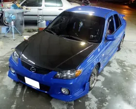 Advan Carbon OEM Style Carbon Fiber Hood Mazda Protege Sedan 2001-2003